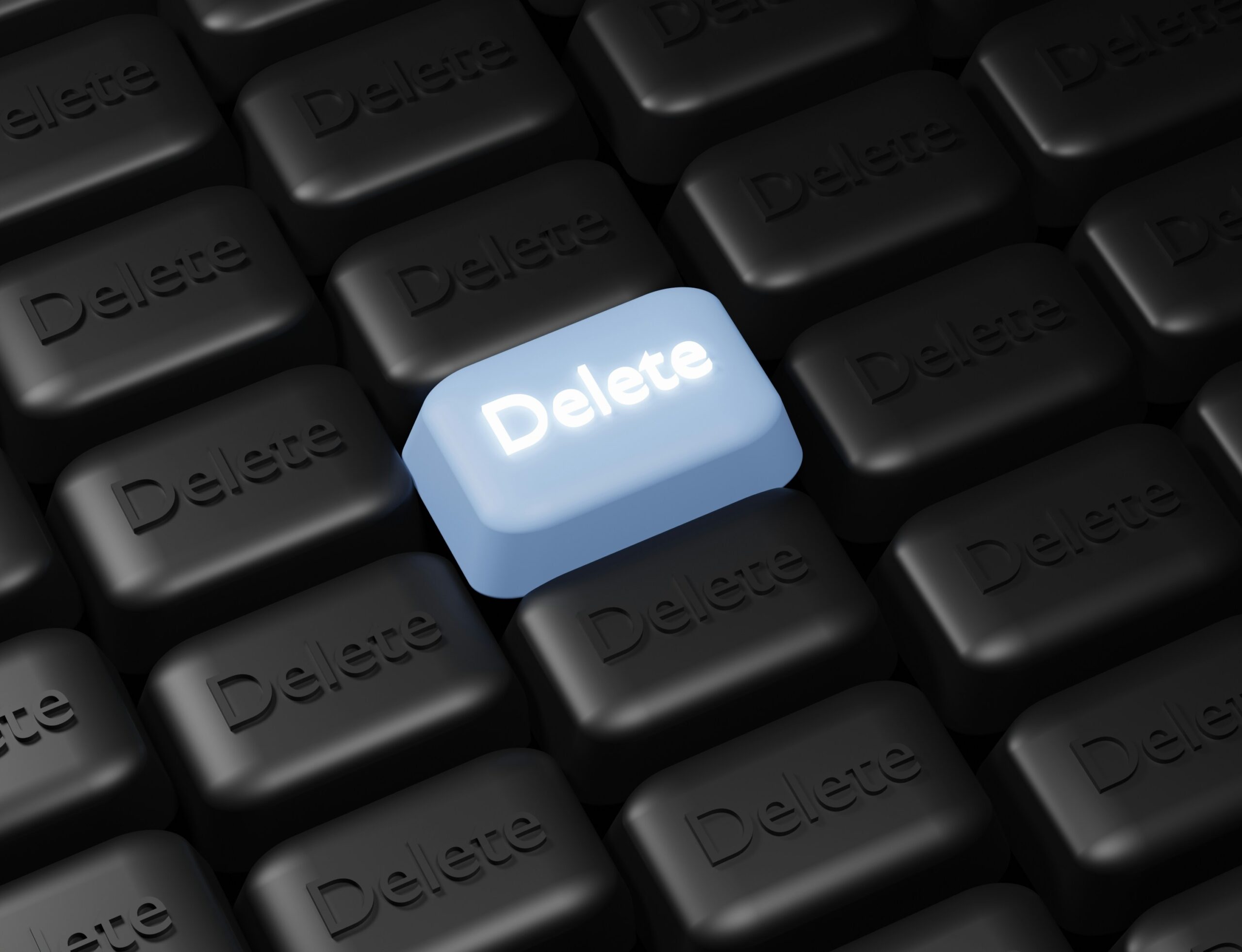 Delete key on a dark keyboard representing data removal services that delete your personal information from data brokers